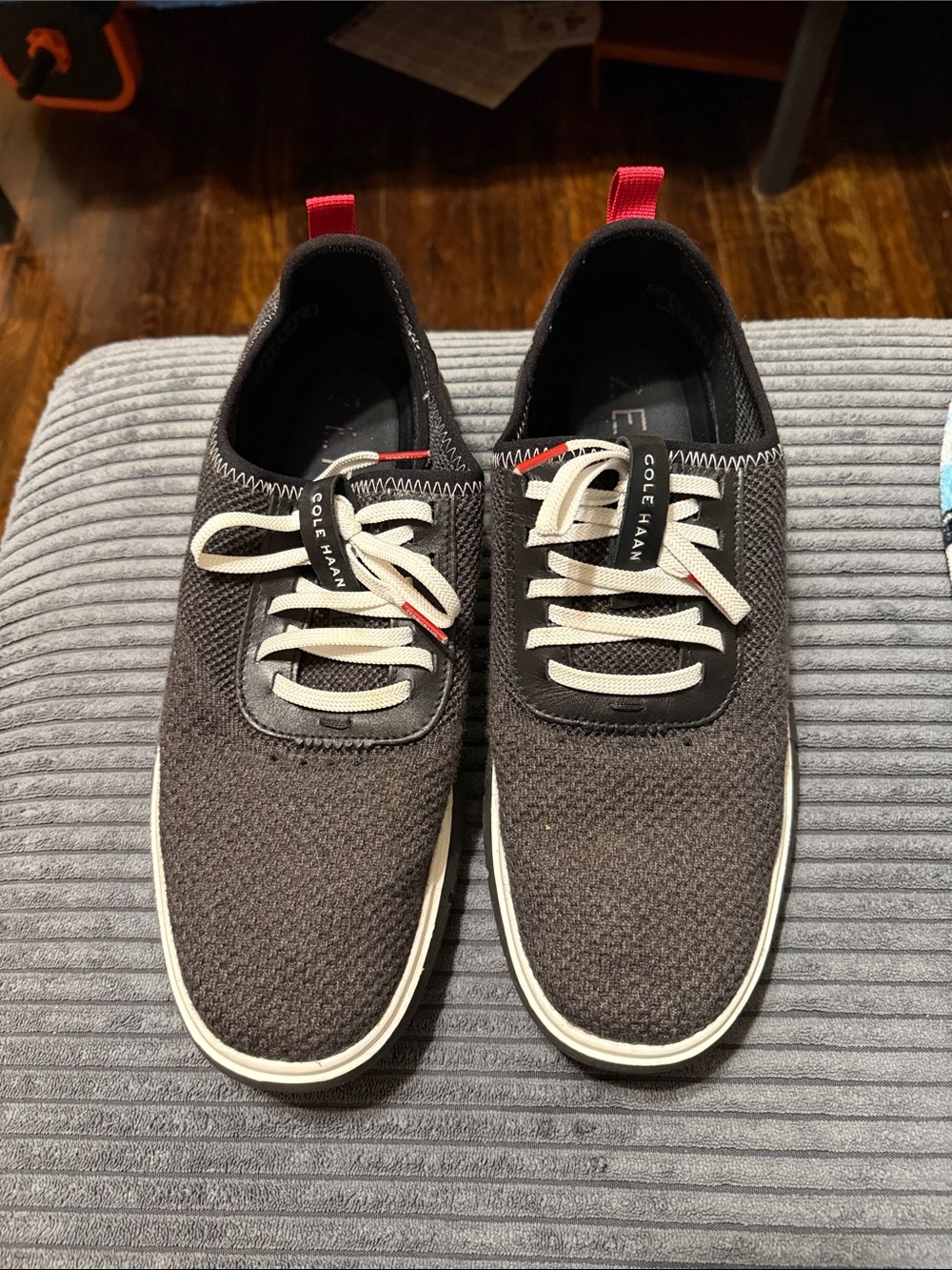 Cole Haan Men’s Knit Sneaker in Charcoal with White Laces and Red Pull Tab